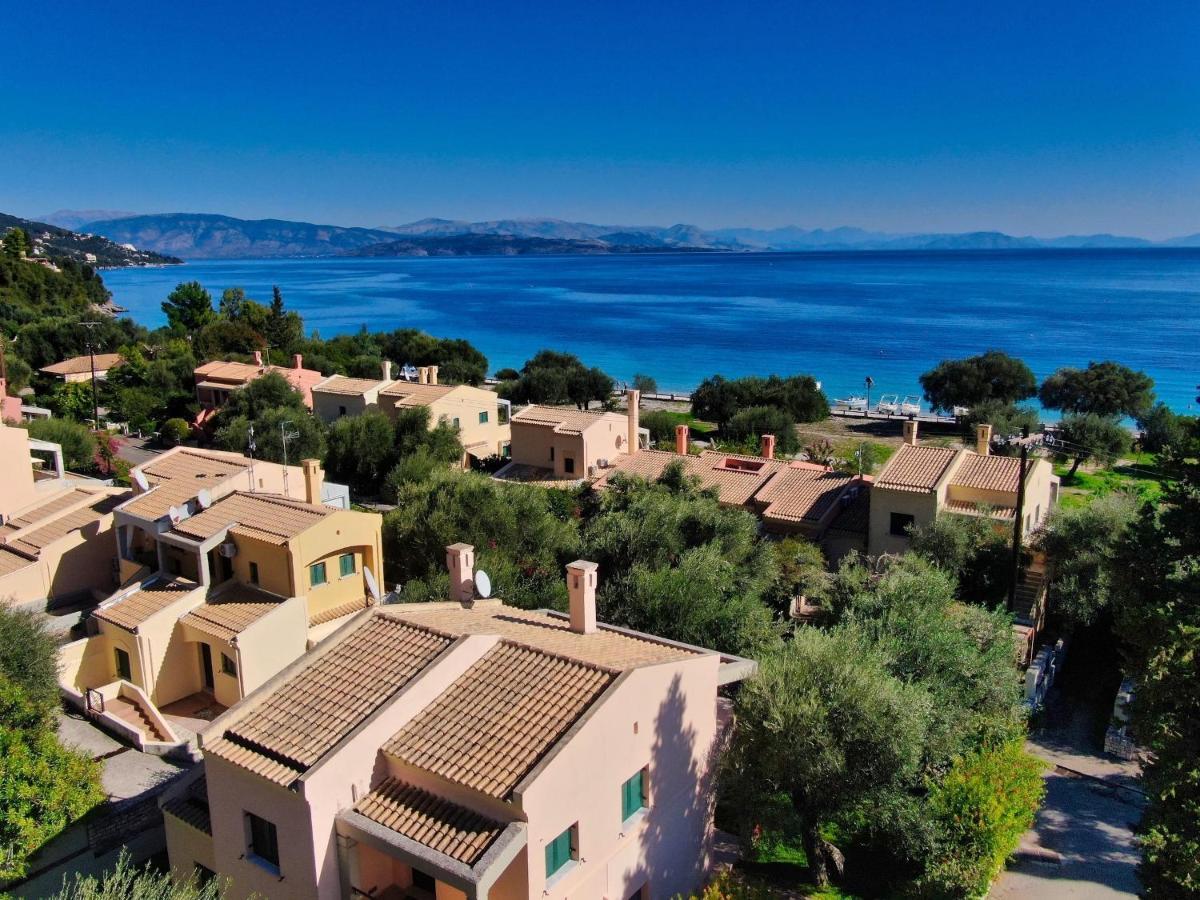 Pebbles And Sea At Barbati With Shared Pool Apartment Bagian luar foto