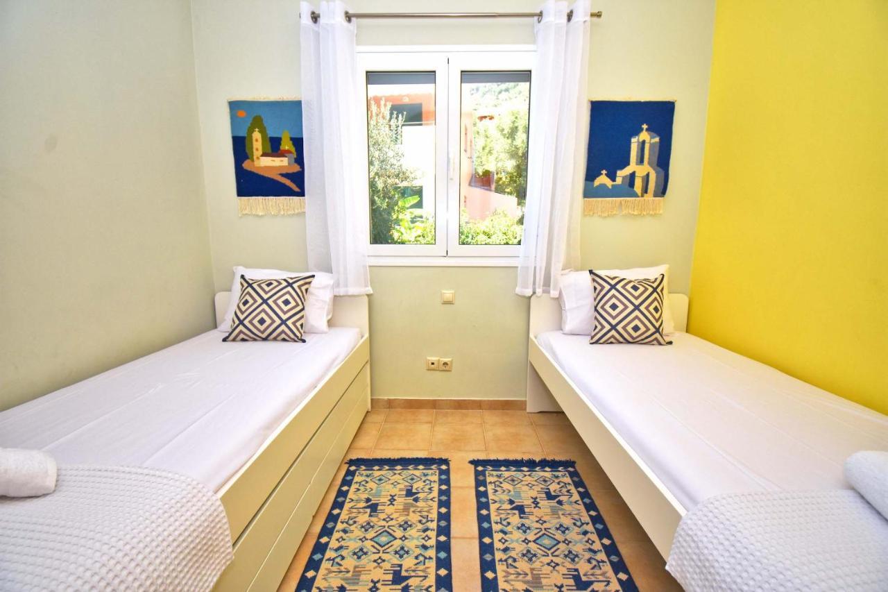 Pebbles And Sea At Barbati With Shared Pool Apartment Bagian luar foto