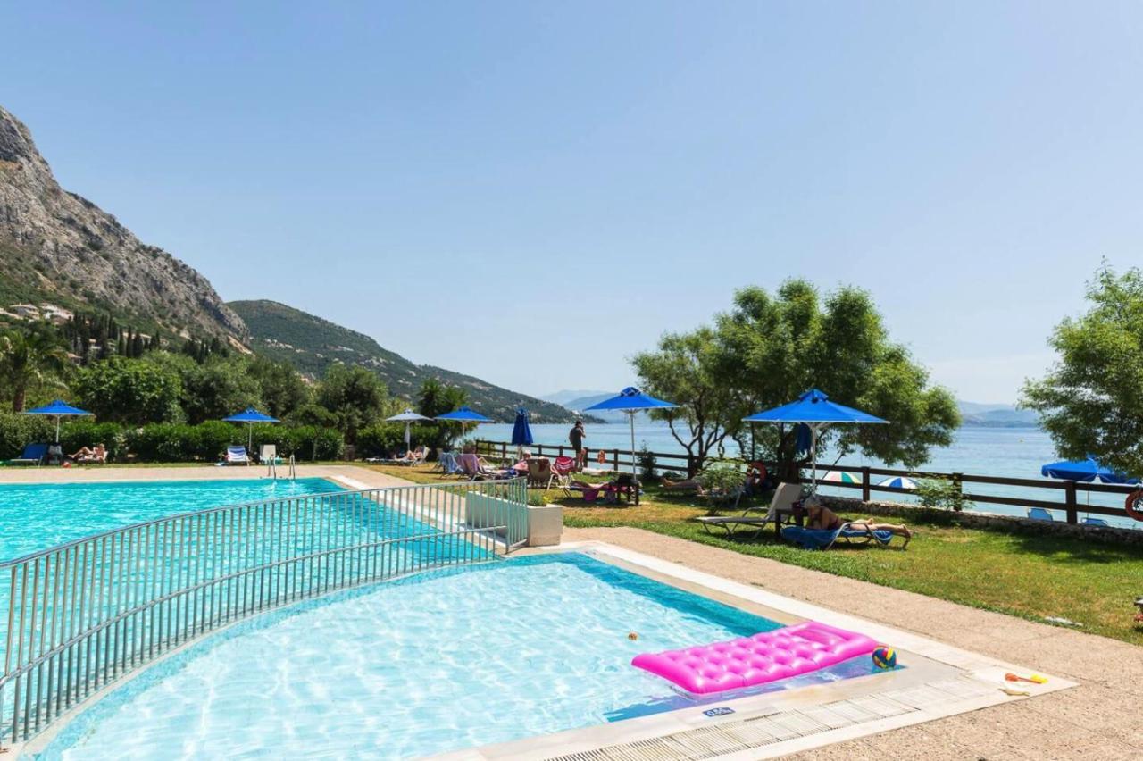 Pebbles And Sea At Barbati With Shared Pool Apartment Bagian luar foto