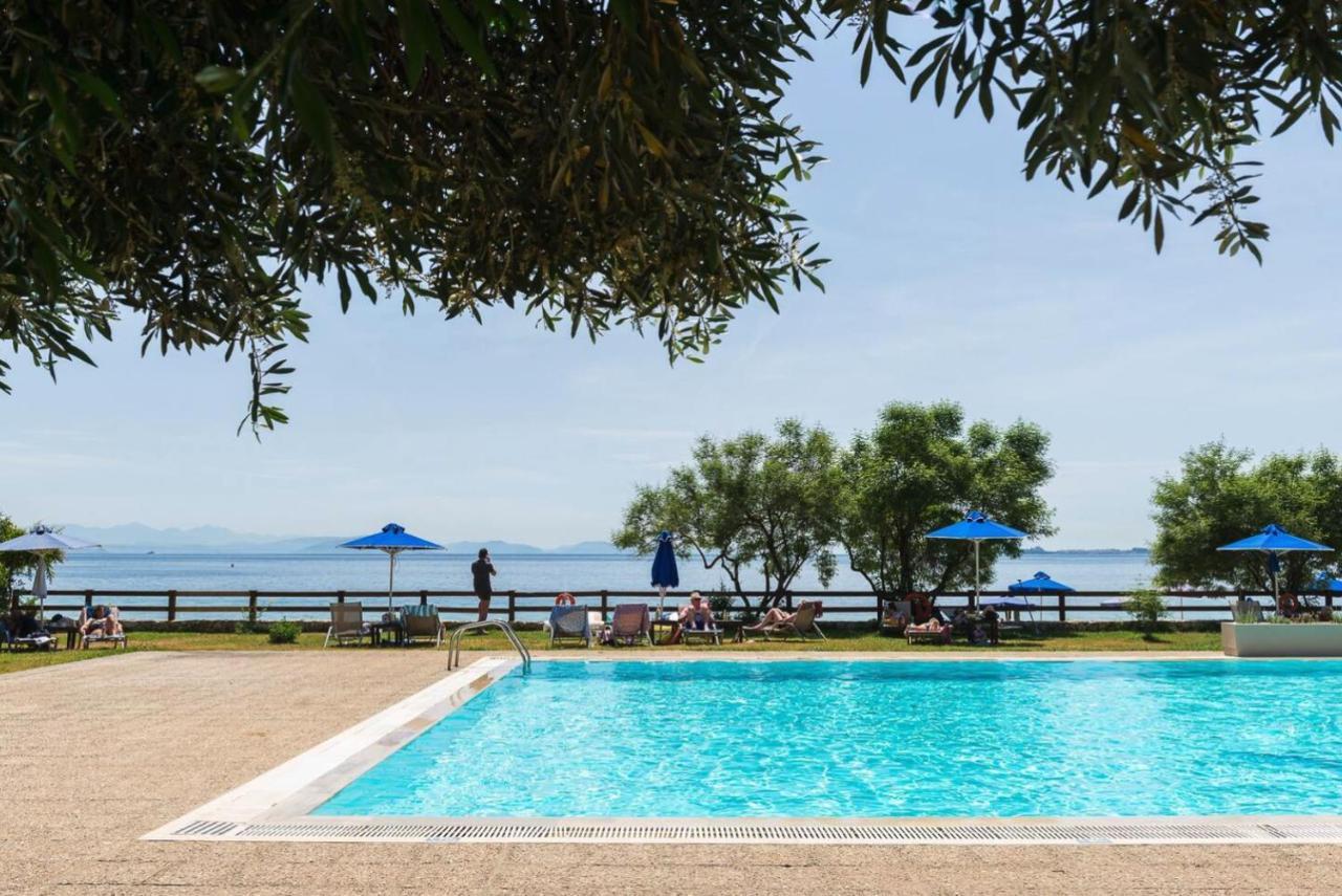 Pebbles And Sea At Barbati With Shared Pool Apartment Bagian luar foto